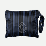 Blue VeðurRó rain poncho packed into its carrying pouch